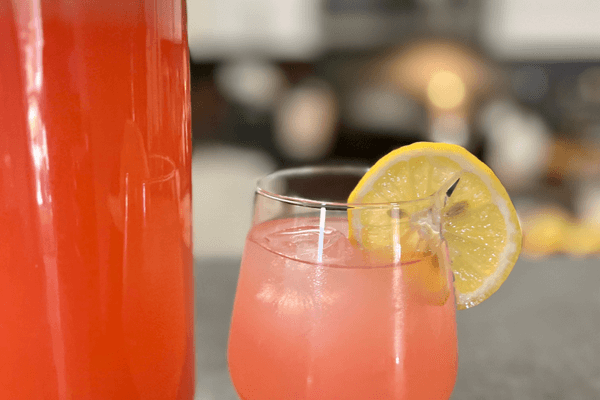 Raspberry lemonade image with glass and lemon for decoration